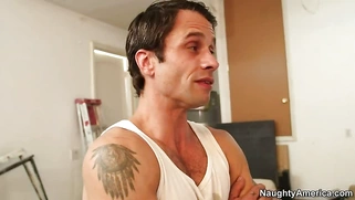 Rikki Six maintains eyecontact then drops on her knees and swallows his cock