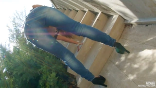 Anita Bellini slides out of her tight jeans outdoors