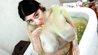 Violet Myers takes the bath and shows off her big melons