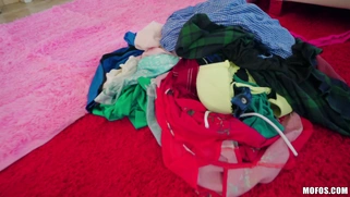 Stevie Grey gets dumped out of the luggage and starts stripping