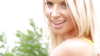 Anikka Albrite in a sexy swimsuit posing outdoor