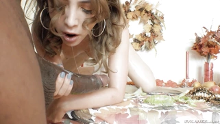 Jane Wilde with the carrot in her ass is sucking huge black cock