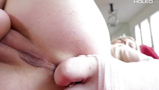 Blonde Kenzie Reeves is playing with the butt plug