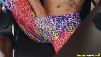 Aaliyah Hadid in glasses is sucking cock on the chair