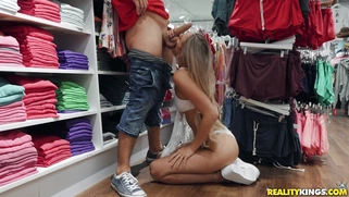 Blonde Addie Andrews on her knees is sucking cock