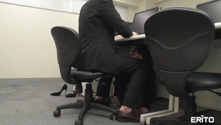Asian is sucking cock under the desk