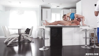 Acrobat Cali Sparks sucks big cock in the bridge position