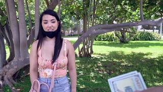 Asian Mina Moon is getting picked up outdoors