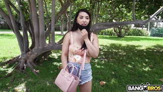Asian Mina Moon is getting picked up outdoors