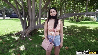 Asian Mina Moon is getting picked up outdoors
