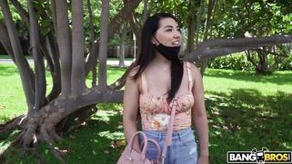 Asian Mina Moon is getting picked up outdoors