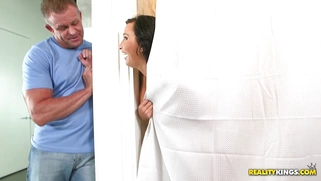 Lezley Zen gives her husband a blowjob while getting fucked by her lover