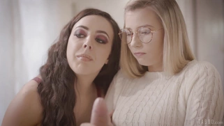 Whitney Wright watches Carolina Sweets sucking the cock