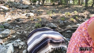 Molly Pills is playing with her pussy outdoors