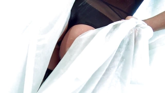 AJ Applegate squirting water from her ass hole and posing in a sexy lingerie