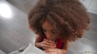 Ebony Cecilia Lion is sucking the white cock and licking balls