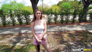 Penelope Kay is getting picked up outdoors