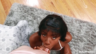 Amari Anne on her knees is sucking Alex Jett's cock