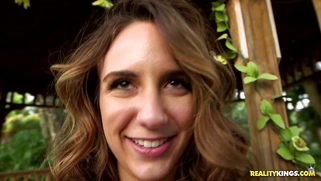 Layla London poses, wearing short dress, stockings and high heels