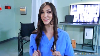 Nurse Holly Michaels sucking Dr. Lee's cock in front of her patient