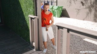 Aria Kai is playing with the dildo outdoors