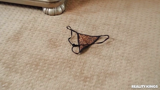 Ebony Lala Ivey on her knees is sucking the white cock