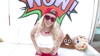 Samantha Rone posing in tight tank top, red shorts and backwards cap