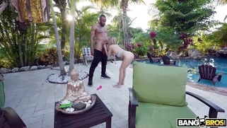 Evelyn Payne is sucking giant black dick poolside