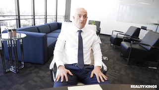 Azul Hermosa is sucking Zac Wild's cock on the desk