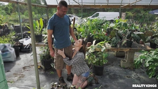 Katie Kingerie is sucking Peter Fitzwell's cock outdoors