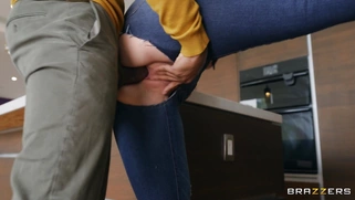 Kay Carter in ripped jeans gets fucked by Musa Phoenix standing