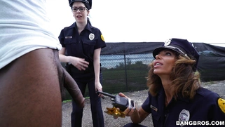 Cock hungry cops Lyla Lali and Norah Gold sucking giant black pole