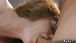 Elena Koshka in glasses is sucking cock in the office