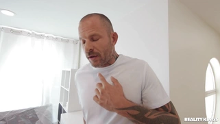 Harley Haze in glasses is sucking Scott Nails' cock