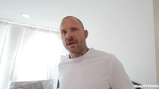 Harley Haze in glasses is sucking Scott Nails' cock