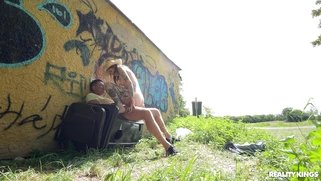 Eden Ivy in hat is fucking Nick Ross outdoors