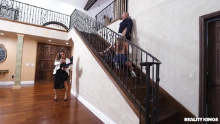 Kendall Kayden on her knees is sucking cock in the kitchen