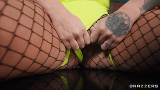 Callie Black in sexy outfit rides the rainbow dildo