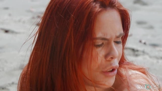 Redhead Gala Brown is riding huge black cock outdoors