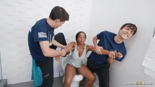 Ebony Lily Starfire is sucking white cock in the toilet