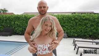 Emma Bugg is sucking Jmac's huge cock poolside