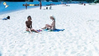 Ravishing nude beach girls tanning