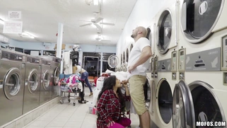 Brunette Caroline Ray sucks fat dick in the laundry