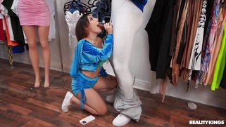 Violet Gems is sucking black cock in the store