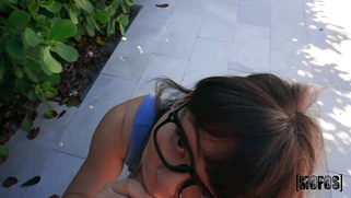 Mochi Mona in glasses is sucking cock and licking balls