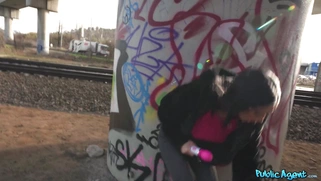 Giulia Diamond is playing with vibrator outdoors