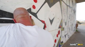 Mellany Lapiedra is sucking two cocks outdoors