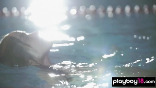 Hot swimmer posing on the starting block