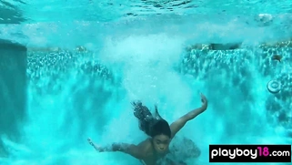 Naked ebony MILF fingers her hairy pussy