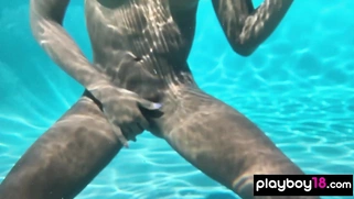 Naked ebony MILF fingers her hairy pussy